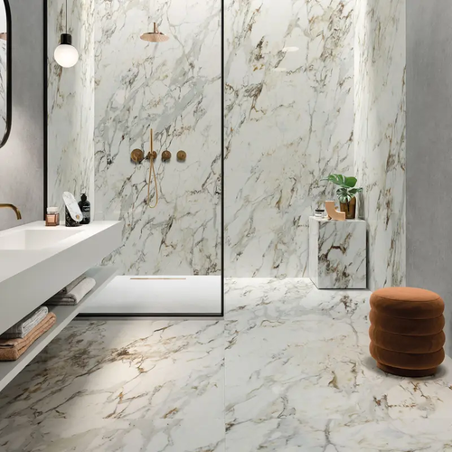 marble bathroom with glass shower